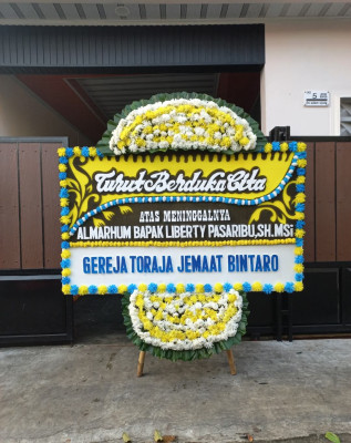 Papan Bunga Duka di Enok